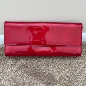 Stuart weitzman patent leather clutch